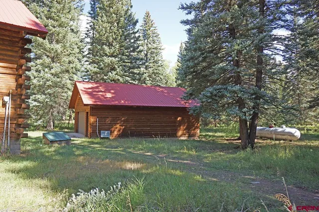 a view of outdoor space and a yard