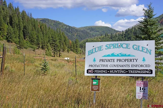 a view of a balcony with chairs