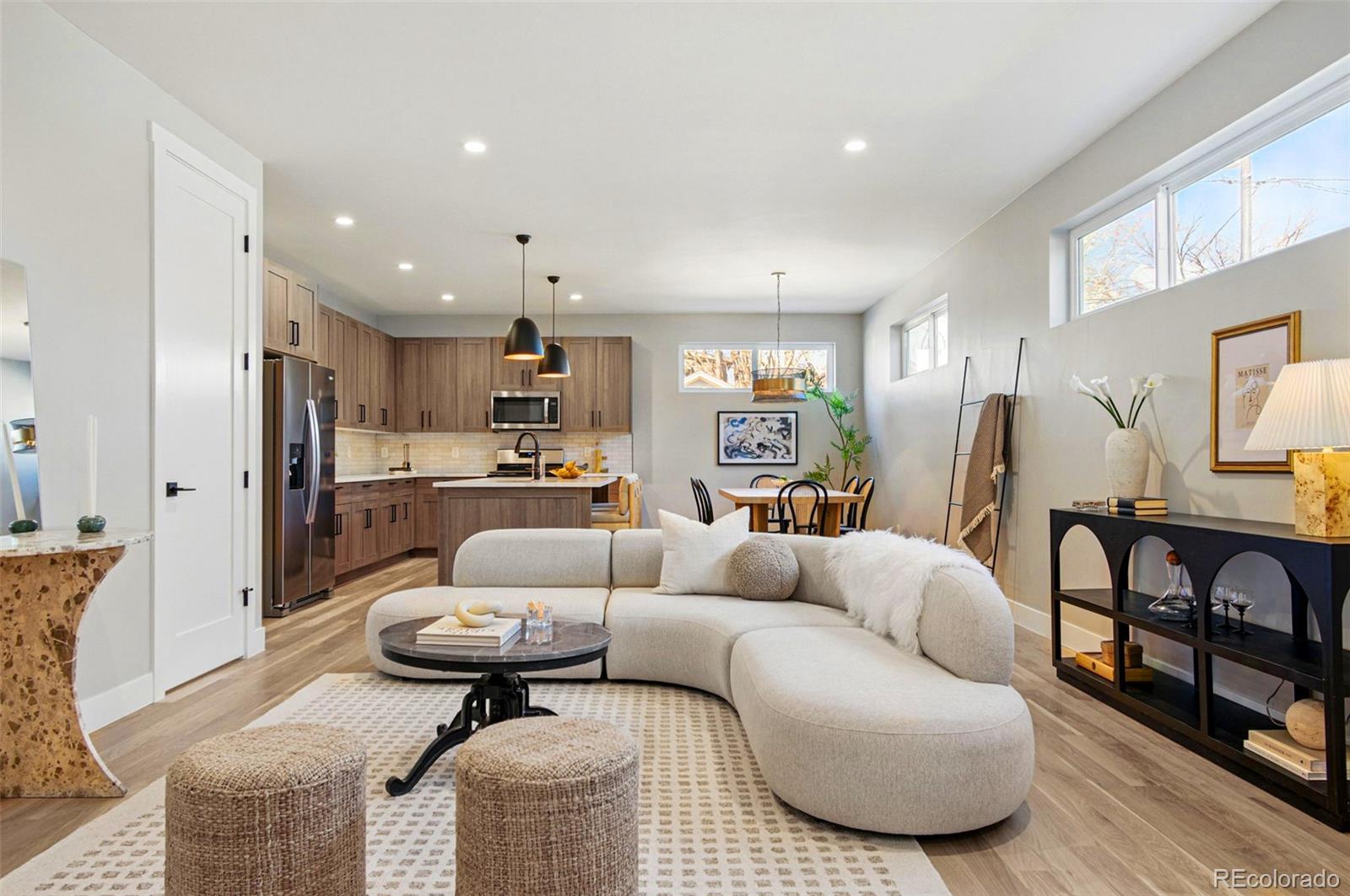 4121 Tejon Street Denver, CO 80211 - Photo 3 of 38 a living room with furniture and kitchen view