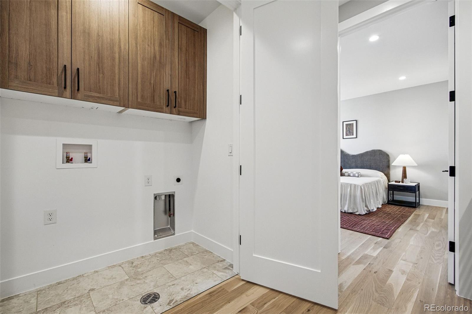 4121 Tejon Street Denver, CO 80211 - Photo 31 of 38 a bedroom with a bed and a window