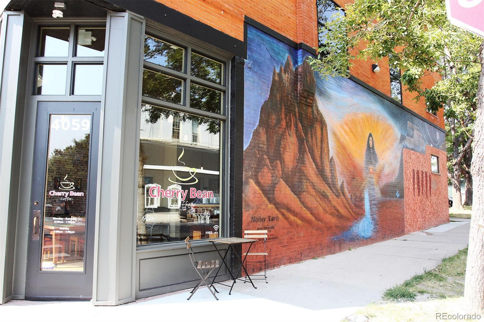 4121 Tejon Street Denver, CO 80211 - Photo 37 of 38 a view of a house with a door and wooden walls