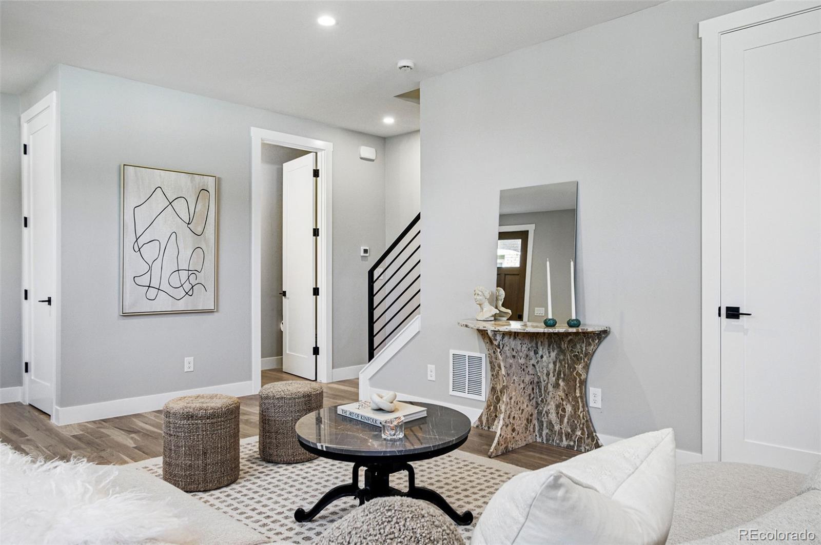 4121 Tejon Street Denver, CO 80211 - Photo 9 of 38 a living room with furniture and a wooden floor