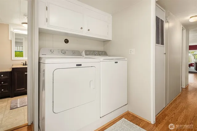 a utility room with dryer and washer