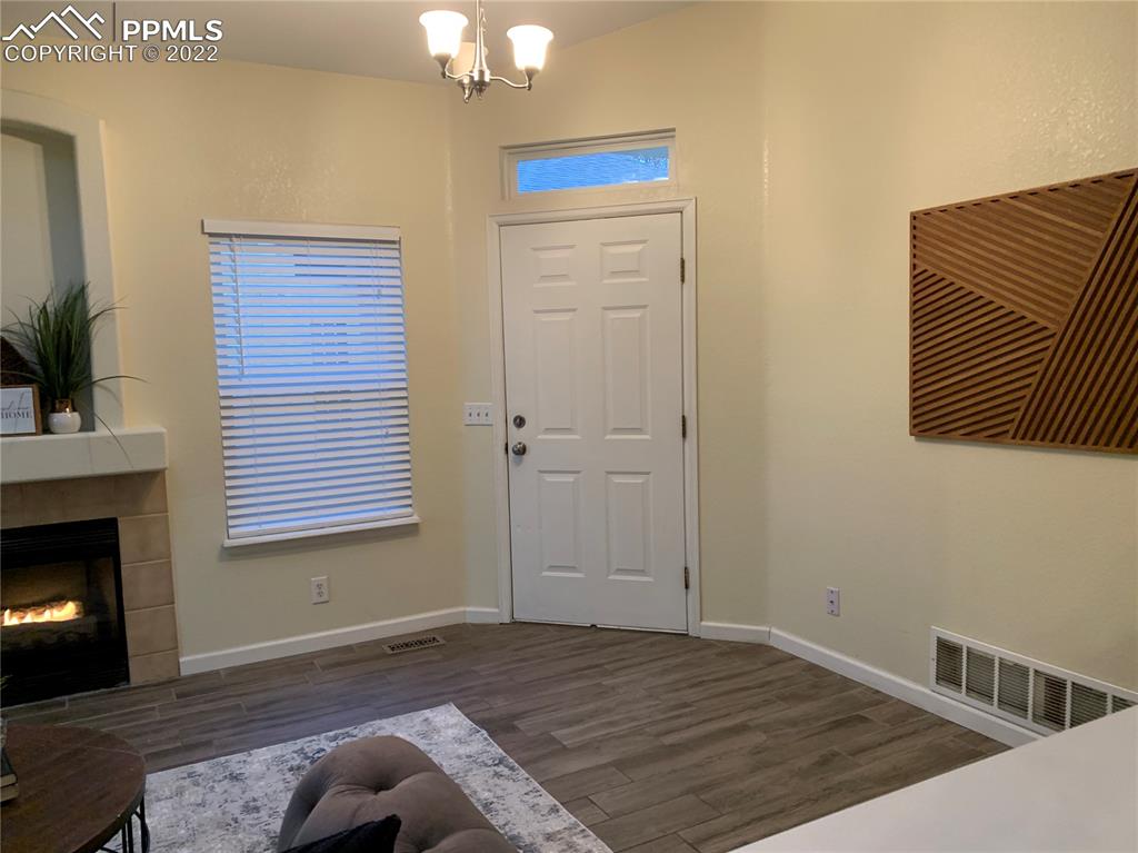 924 Samuel Point Colorado Springs, CO 80906 - Photo 16 of 22 a view of a livingroom with a fireplace