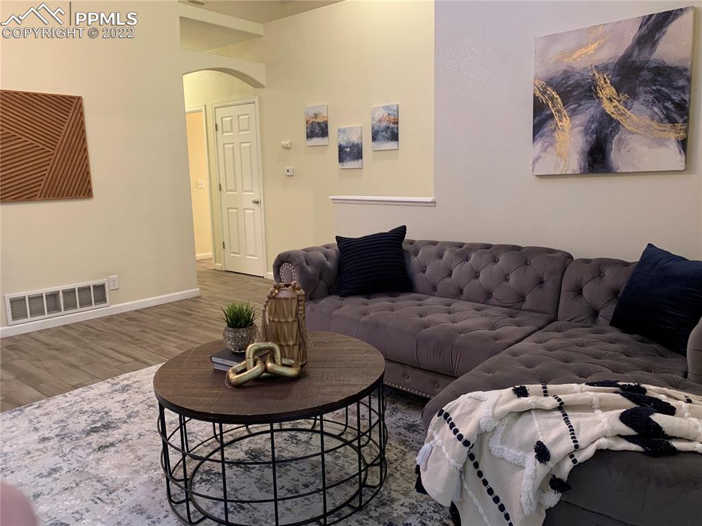 924 Samuel Point Colorado Springs, CO 80906 - Photo 19 of 22 a living room with furniture and a table
