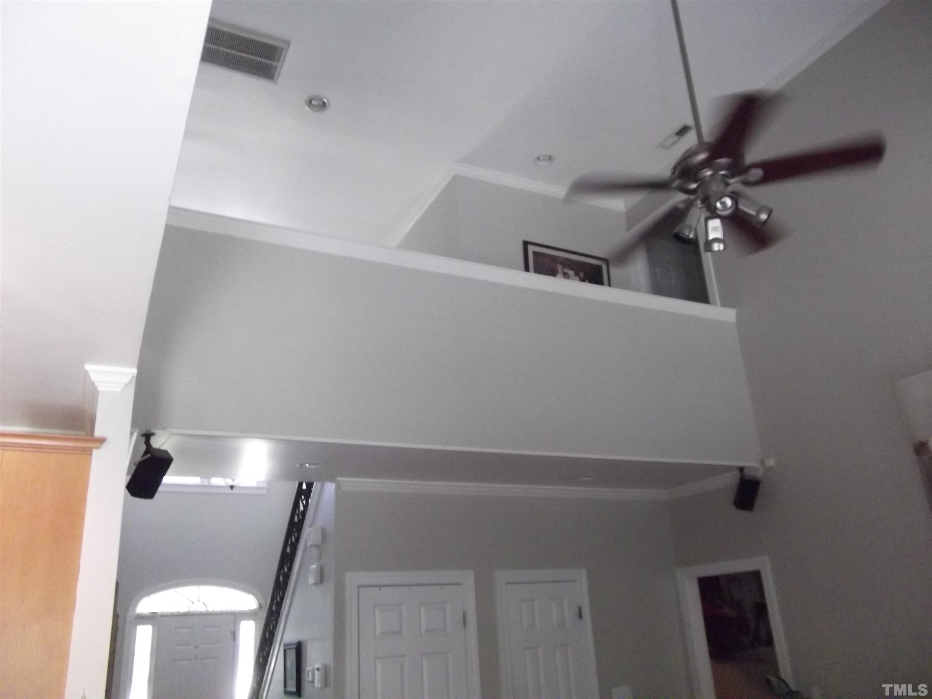 7912 Milltrace Run Raleigh, NC 27615 - Photo 17 of 36 a view of a hallway with a closet