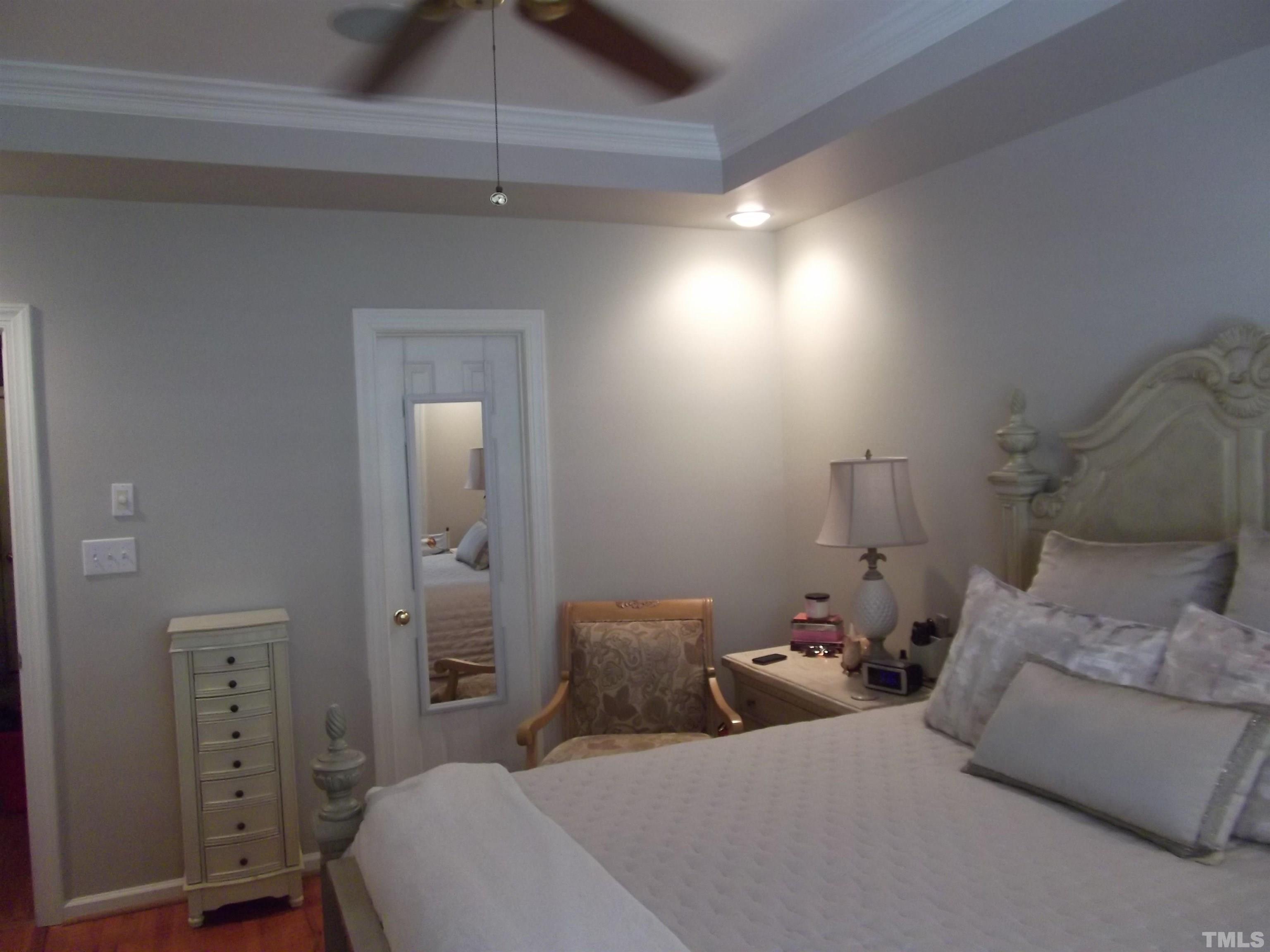 7912 Milltrace Run Raleigh, NC 27615 - Photo 23 of 36 a bed room with two twin beds in it