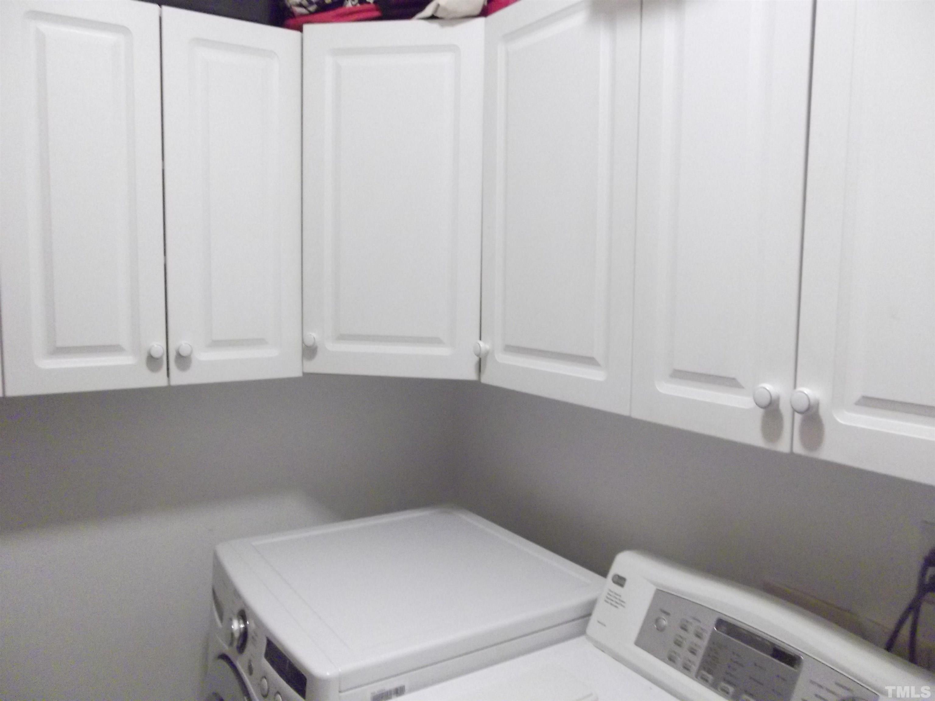 7912 Milltrace Run Raleigh, NC 27615 - Photo 30 of 36 a bathroom with a toilet