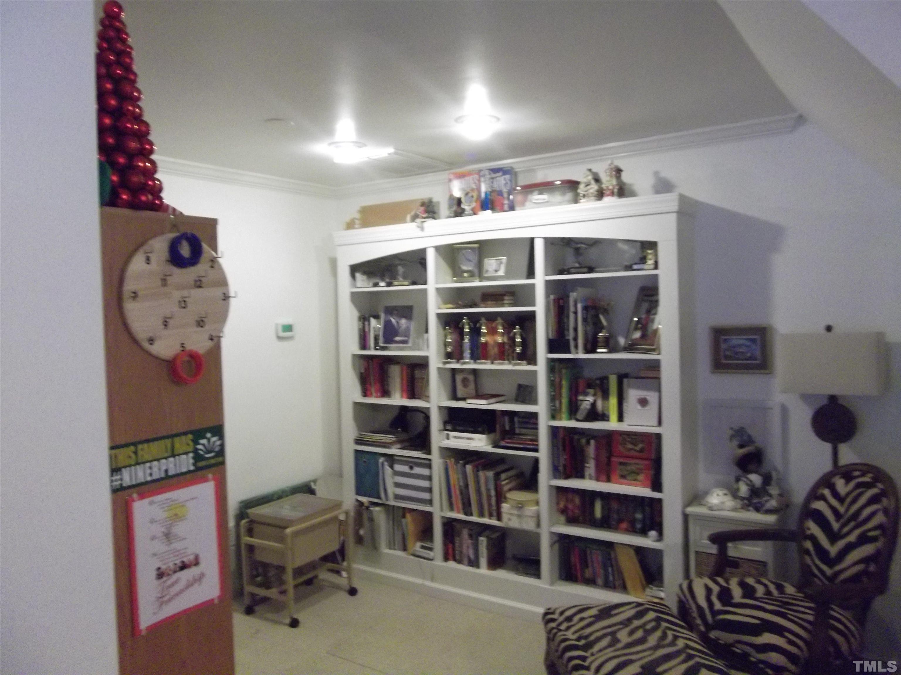 7912 Milltrace Run Raleigh, NC 27615 - Photo 32 of 36 a view of a workspace with furniture