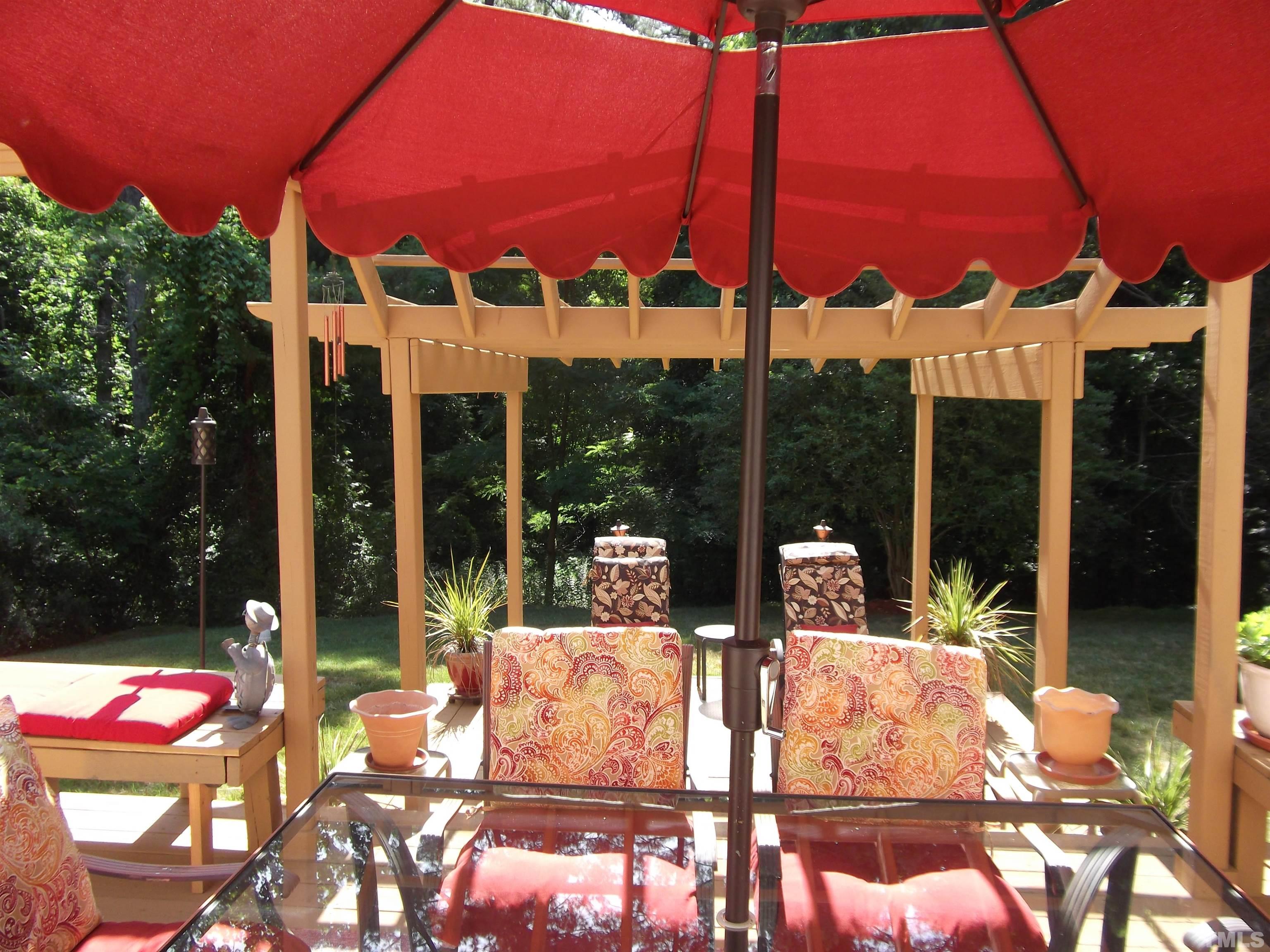 7912 Milltrace Run Raleigh, NC 27615 - Photo 34 of 36 a view of an outdoor sitting area