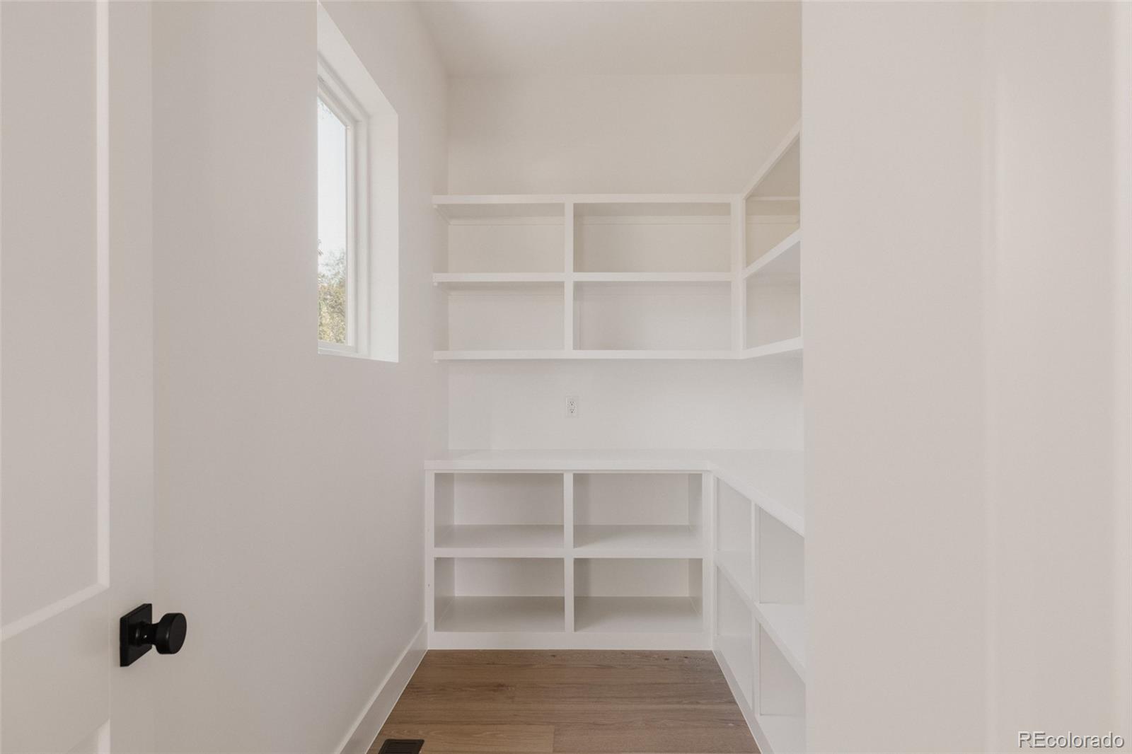 3530 Fenton Street Wheat Ridge, CO 80212 - Photo 13 of 44 a view of a room with shelf