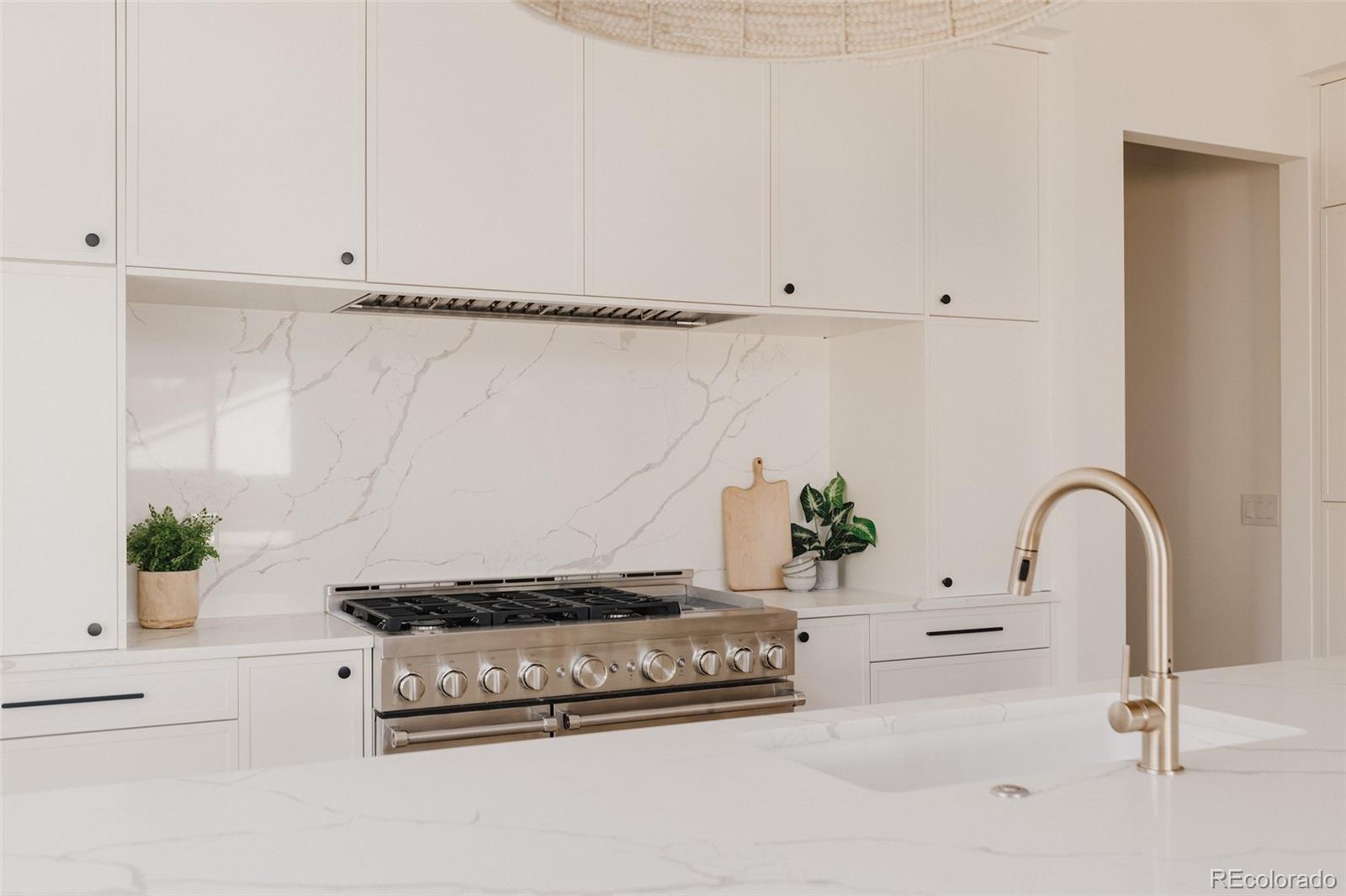 3530 Fenton Street Wheat Ridge, CO 80212 - Photo 14 of 44 a bathroom with a bathtub