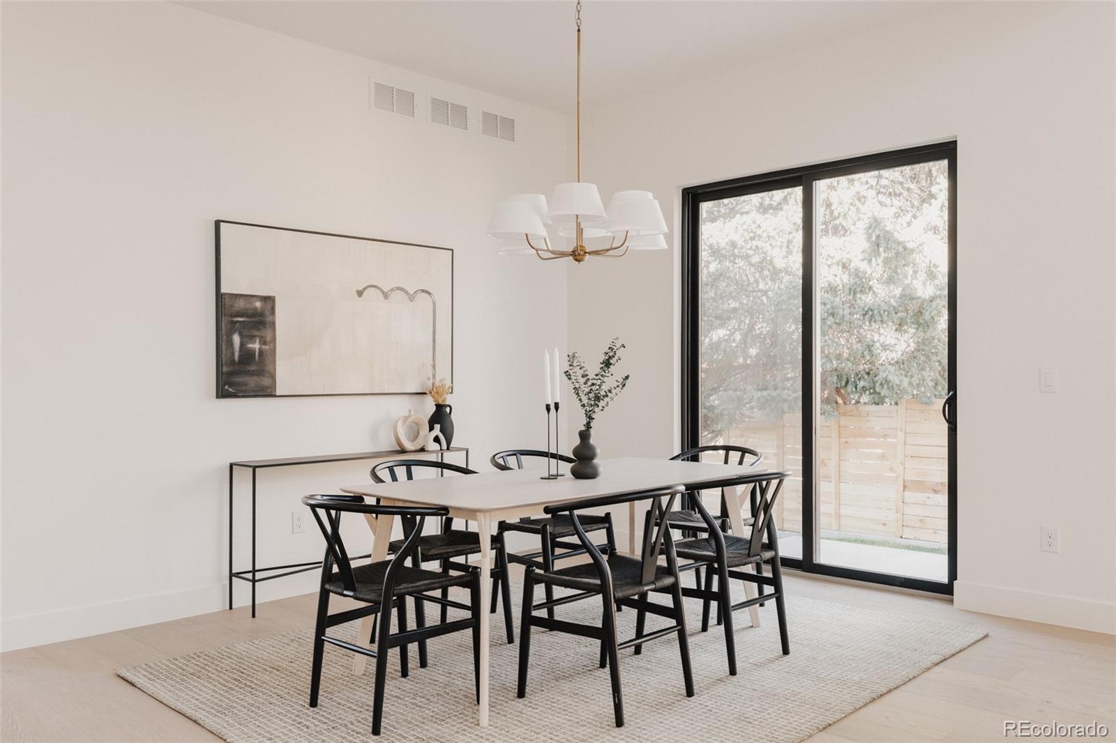 3530 Fenton Street Wheat Ridge, CO 80212 - Photo 15 of 44 a view of a dining room with furniture and window