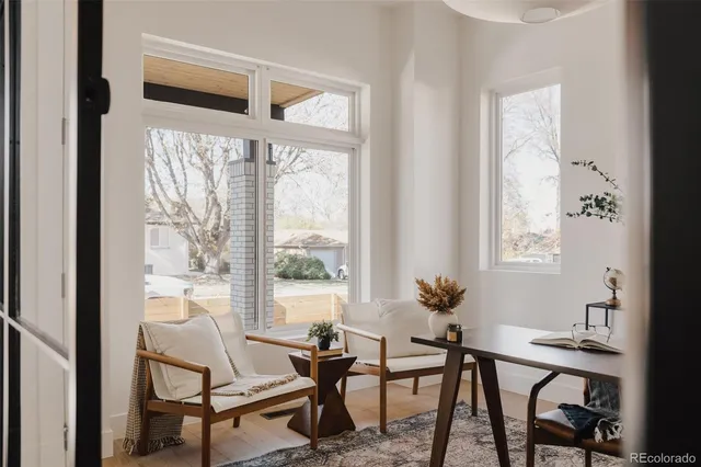a view of a hallway with windows