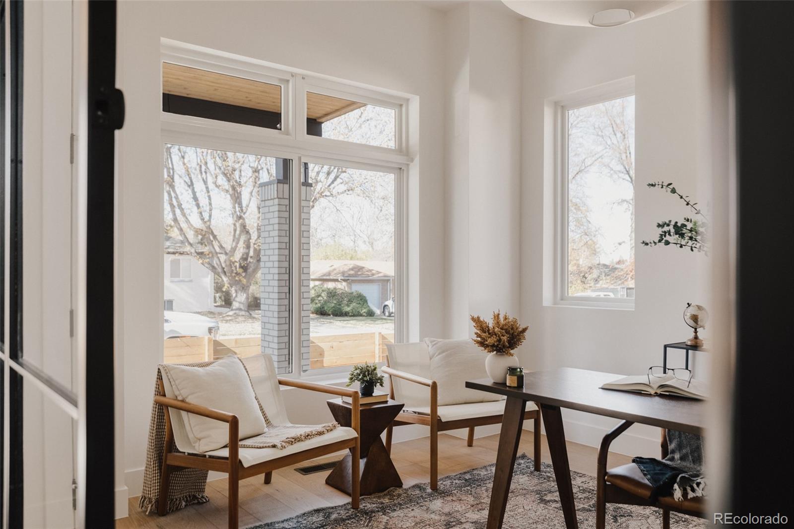 3530 Fenton Street Wheat Ridge, CO 80212 - Photo 16 of 44 a workspace room with furniture and windows