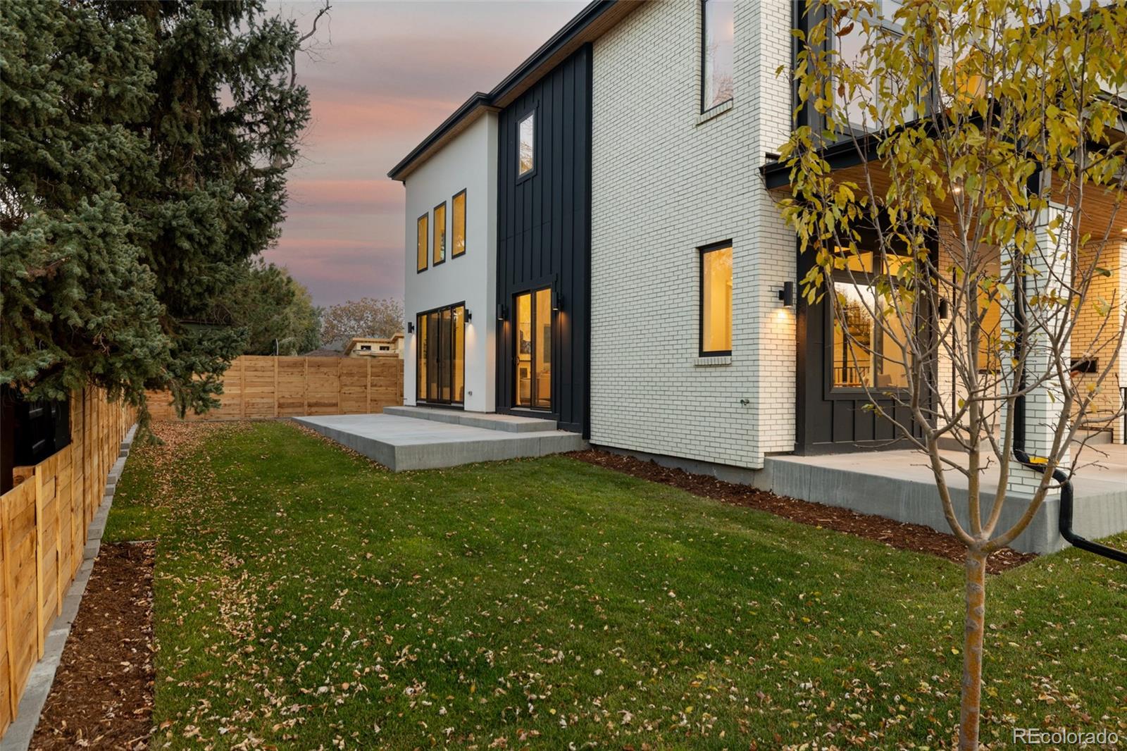 3530 Fenton Street Wheat Ridge, CO 80212 - Photo 20 of 44 a view of a house with a yard