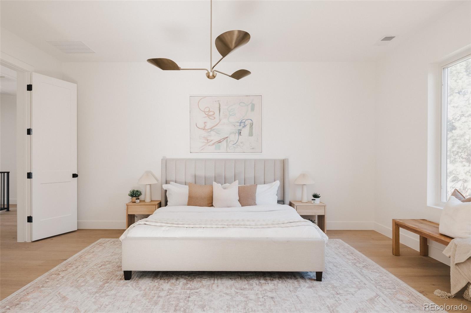 3530 Fenton Street Wheat Ridge, CO 80212 - Photo 23 of 44 a bedroom with a bed and window