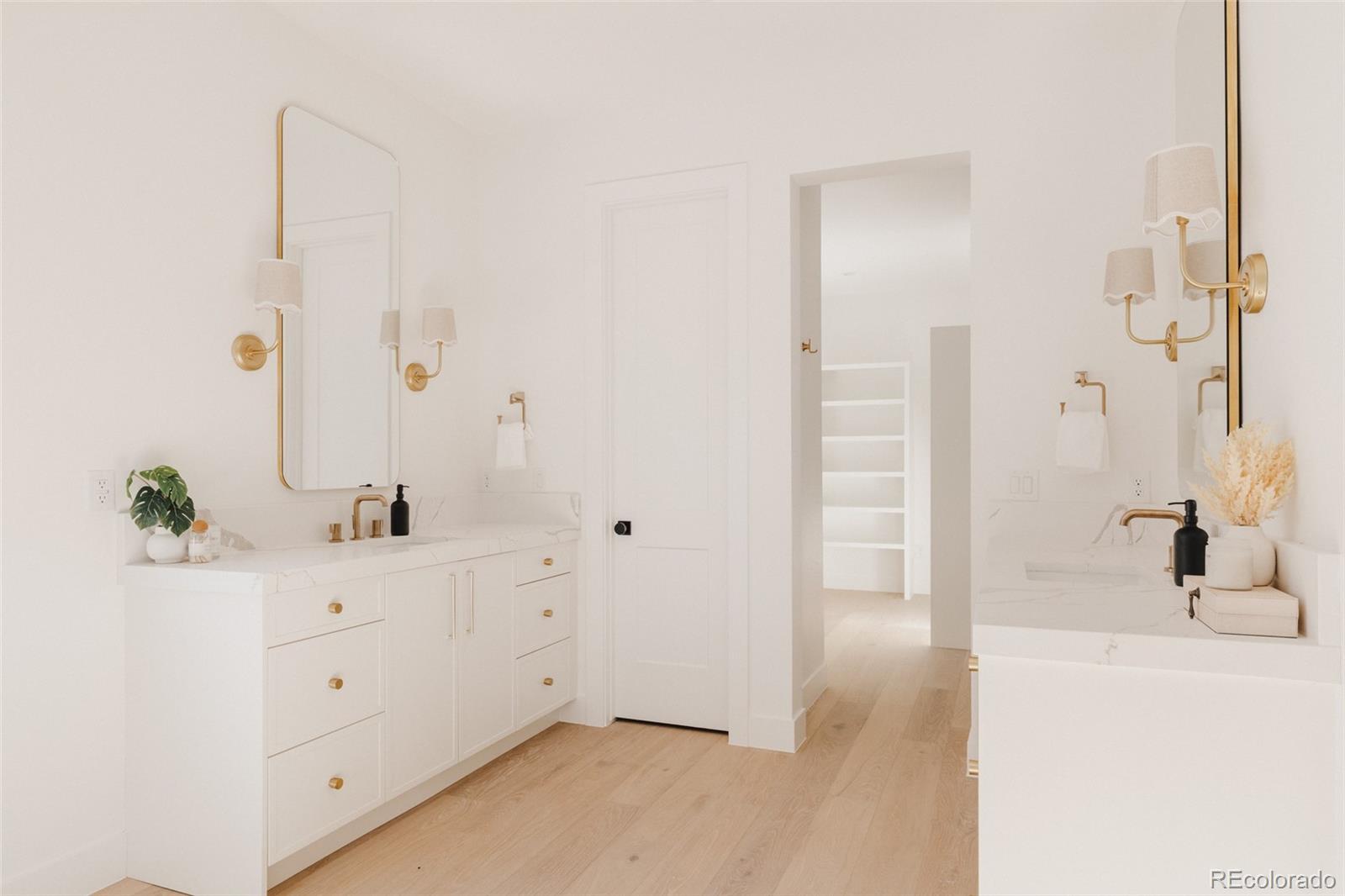 3530 Fenton Street Wheat Ridge, CO 80212 - Photo 24 of 44 a bathroom with a sink and a mirror
