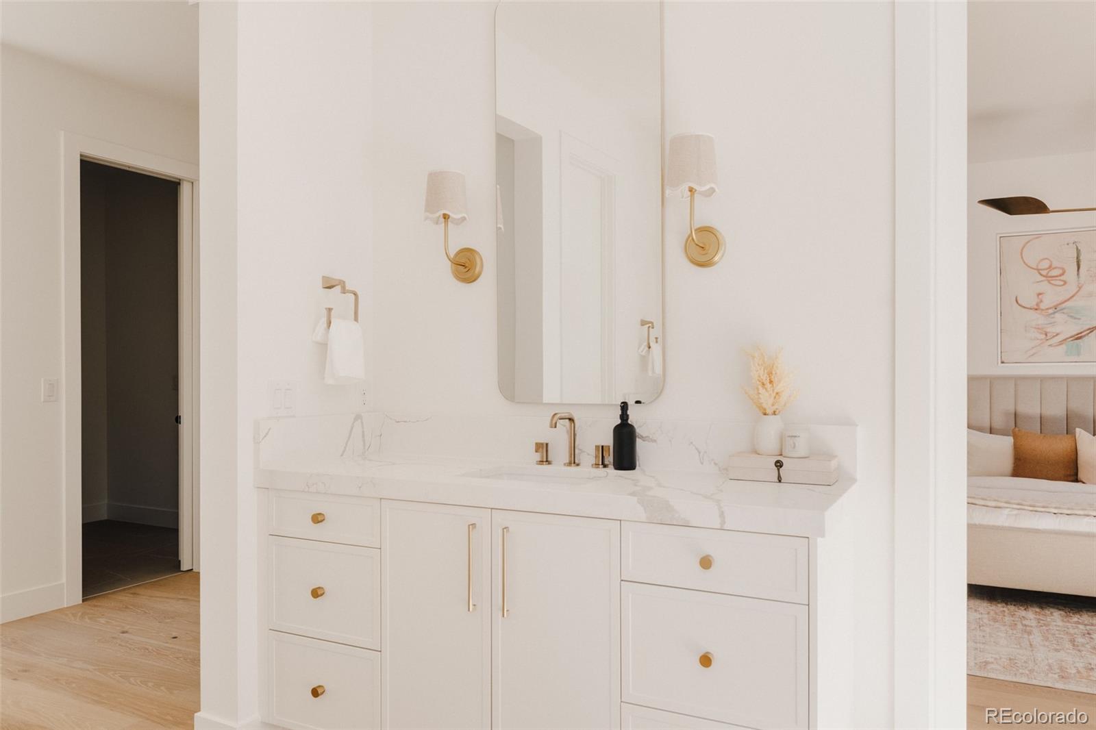 3530 Fenton Street Wheat Ridge, CO 80212 - Photo 25 of 44 a bathroom with a sink and a mirror