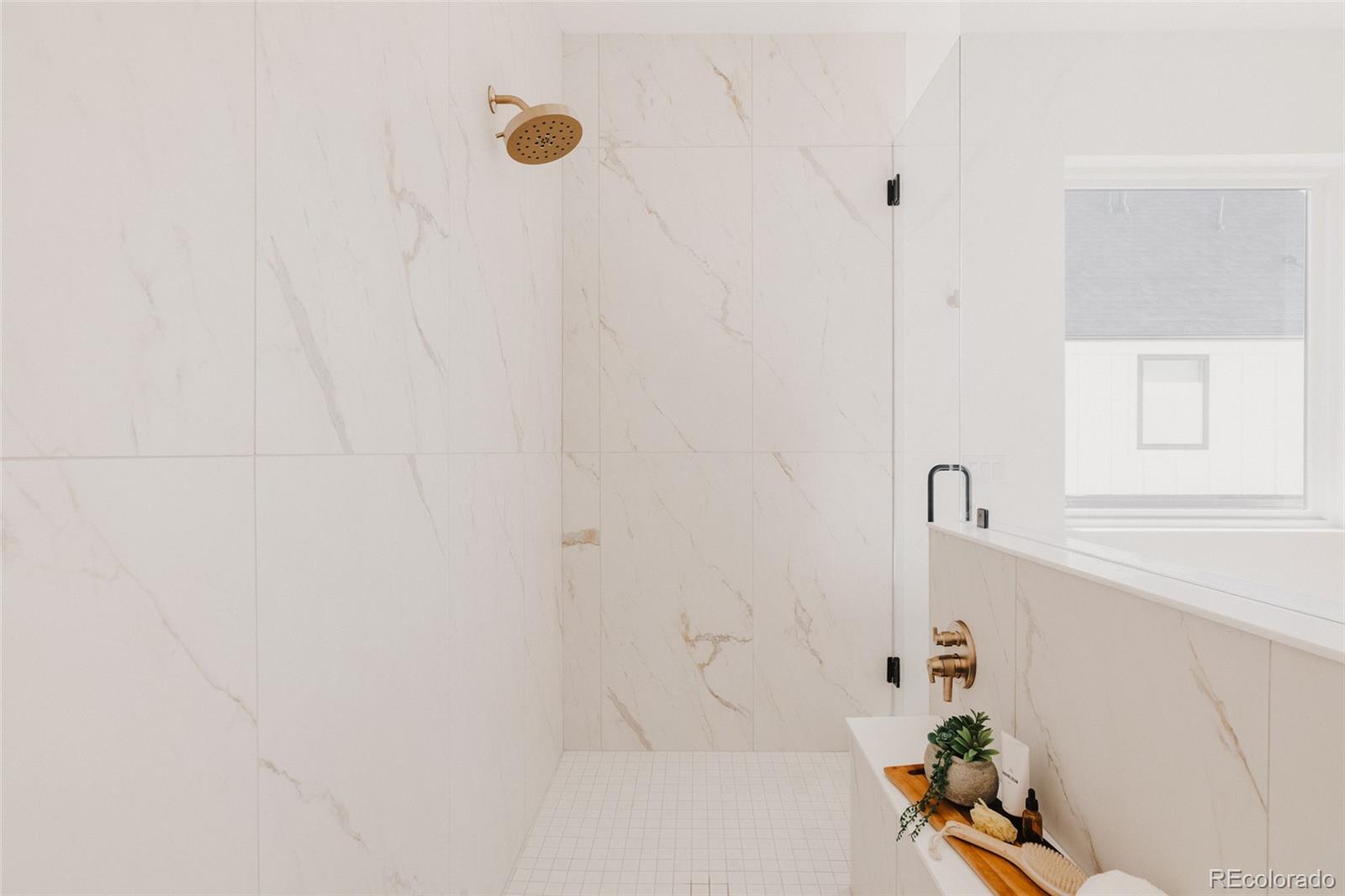 3530 Fenton Street Wheat Ridge, CO 80212 - Photo 27 of 44 a bathroom with a bathtub