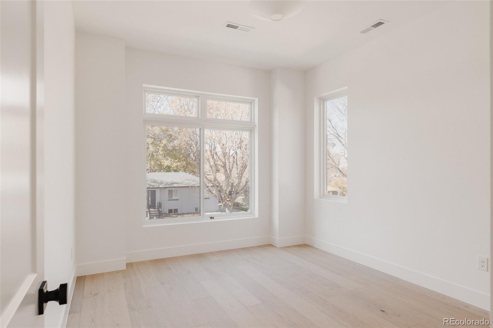 3530 Fenton Street Wheat Ridge, CO 80212 - Photo 32 of 44 a view of an empty room with a window
