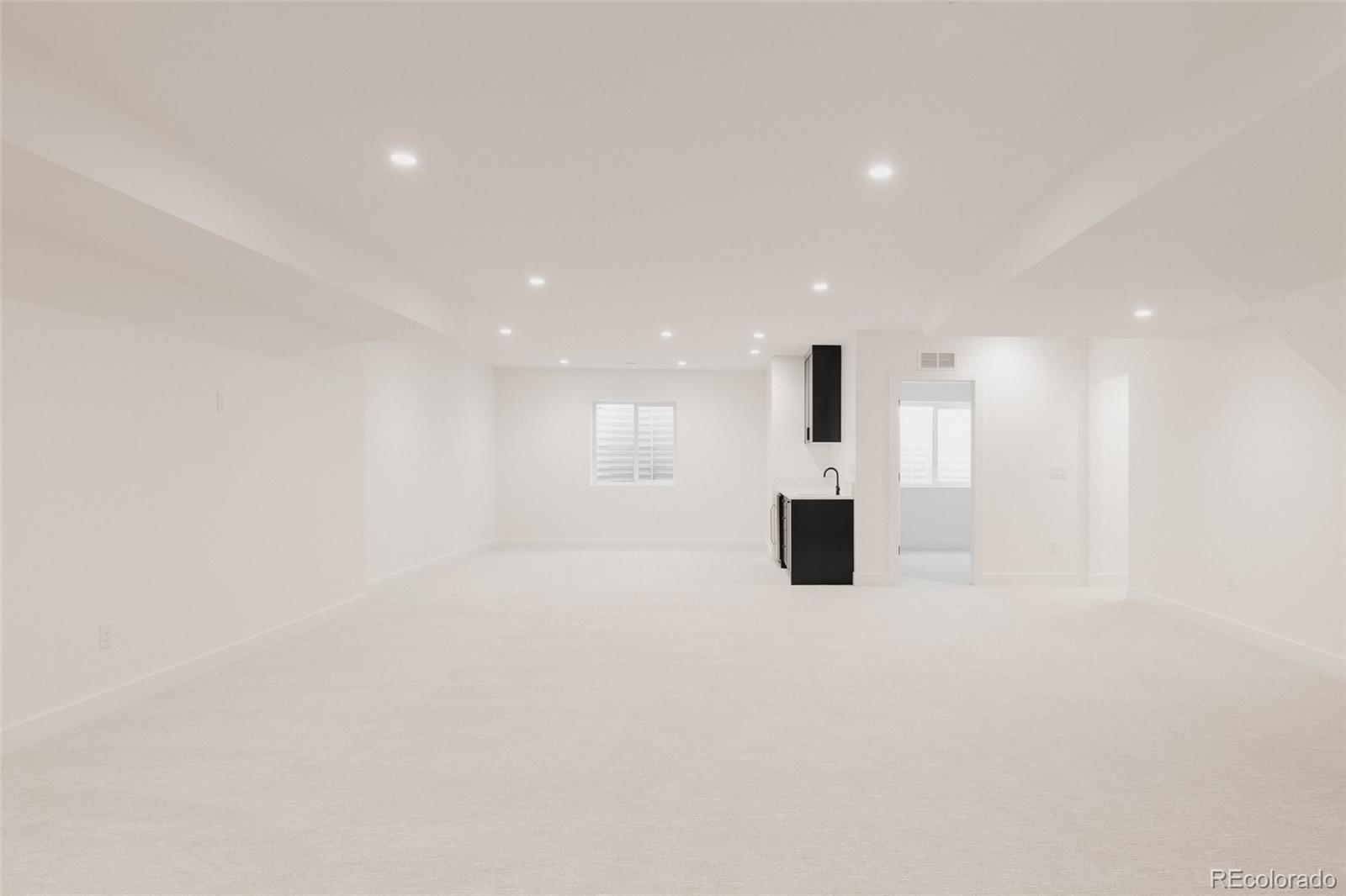 3530 Fenton Street Wheat Ridge, CO 80212 - Photo 37 of 44 a view of a big room with an empty space