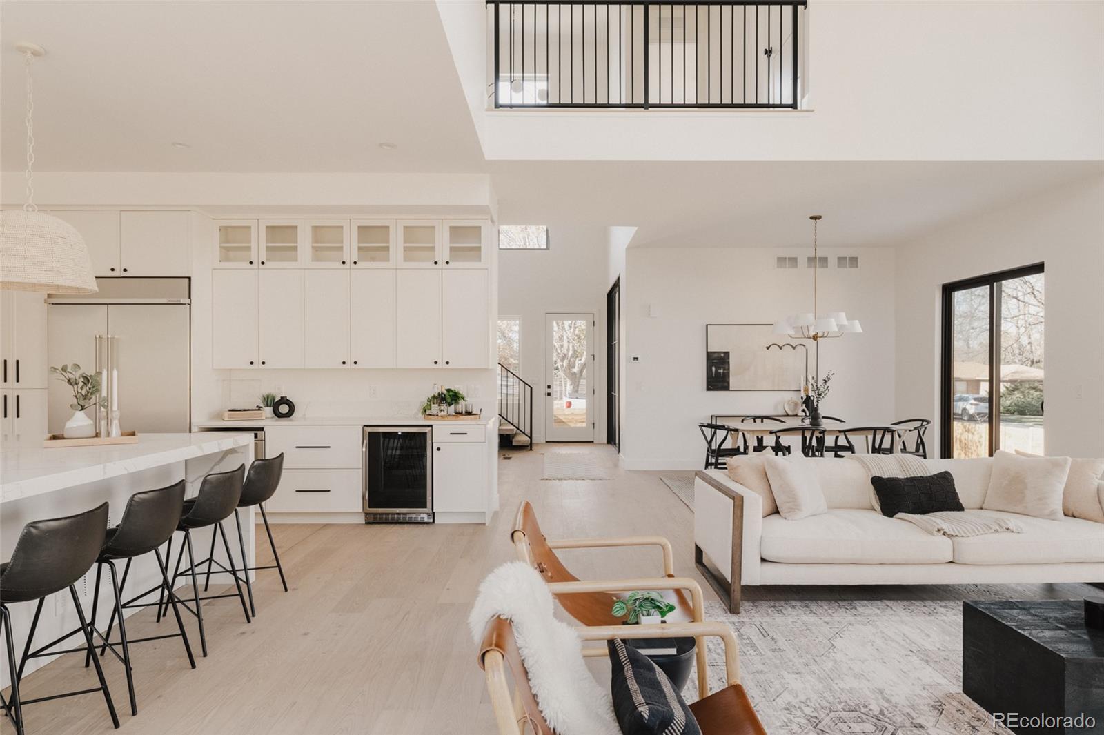 3530 Fenton Street Wheat Ridge, CO 80212 - Photo 4 of 44 a living room with furniture and a table