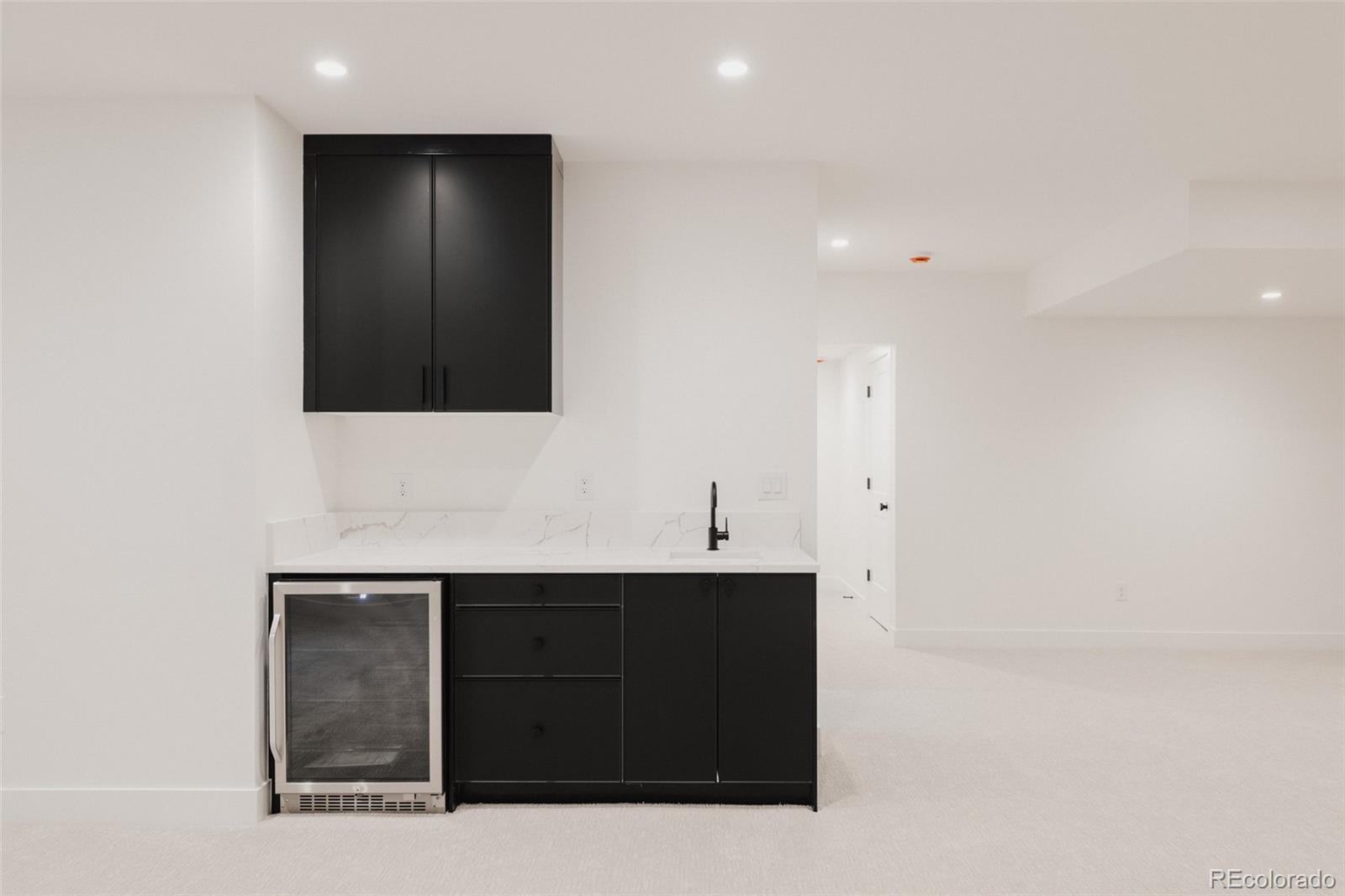 3530 Fenton Street Wheat Ridge, CO 80212 - Photo 42 of 44 a bathroom with a sink and a mirror