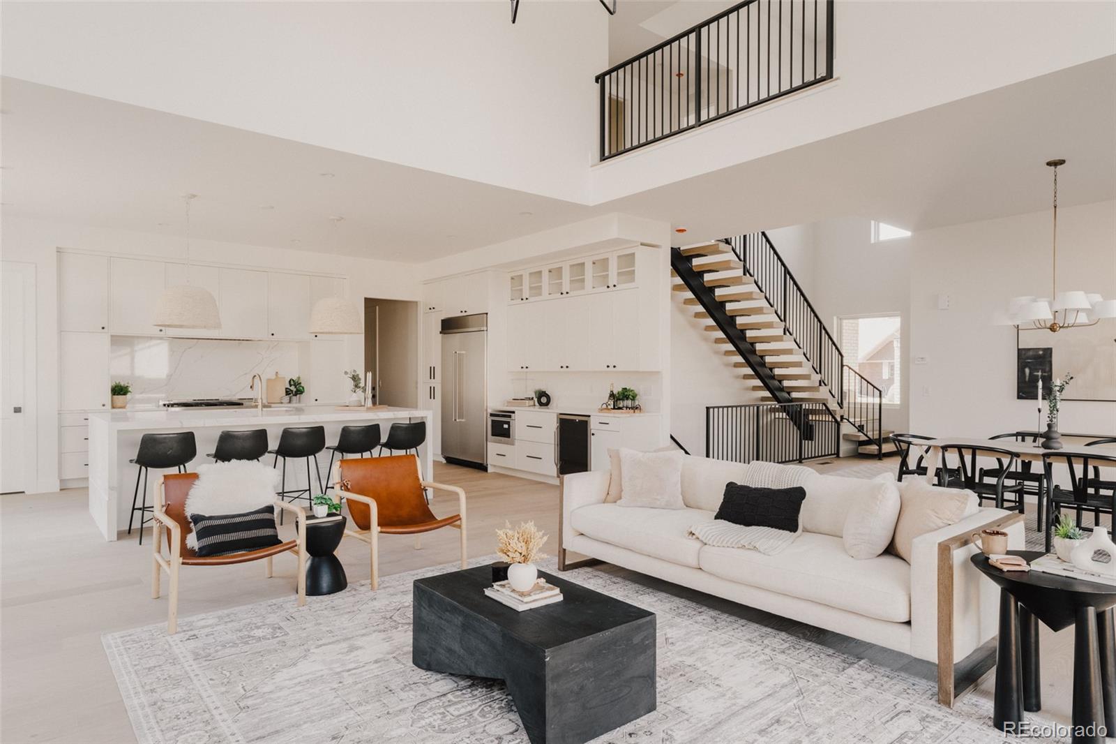 3530 Fenton Street Wheat Ridge, CO 80212 - Photo 6 of 44 a living room with furniture and wooden floor