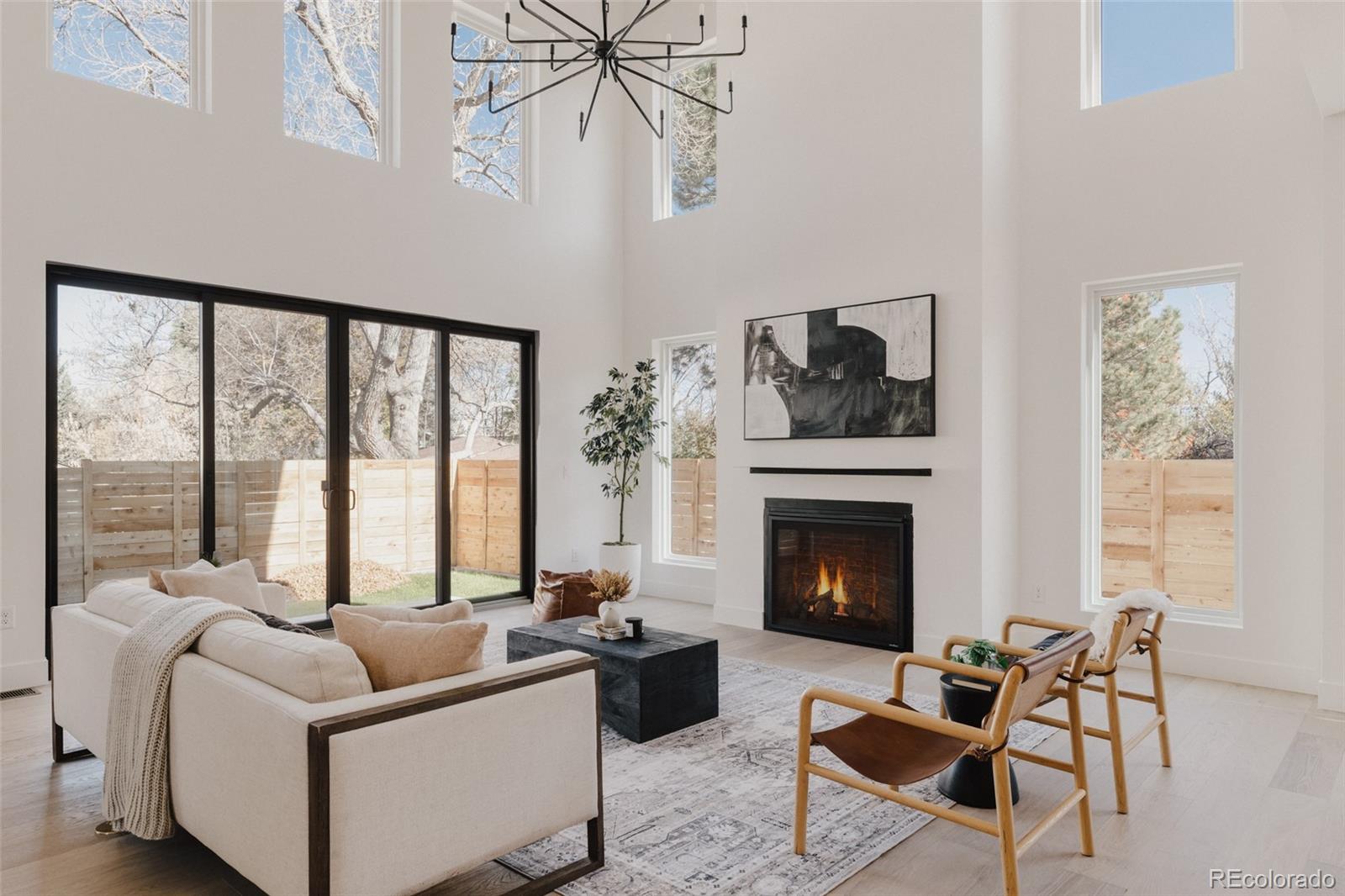 3530 Fenton Street Wheat Ridge, CO 80212 - Photo 10 of 44 a living room with furniture and a fireplace
