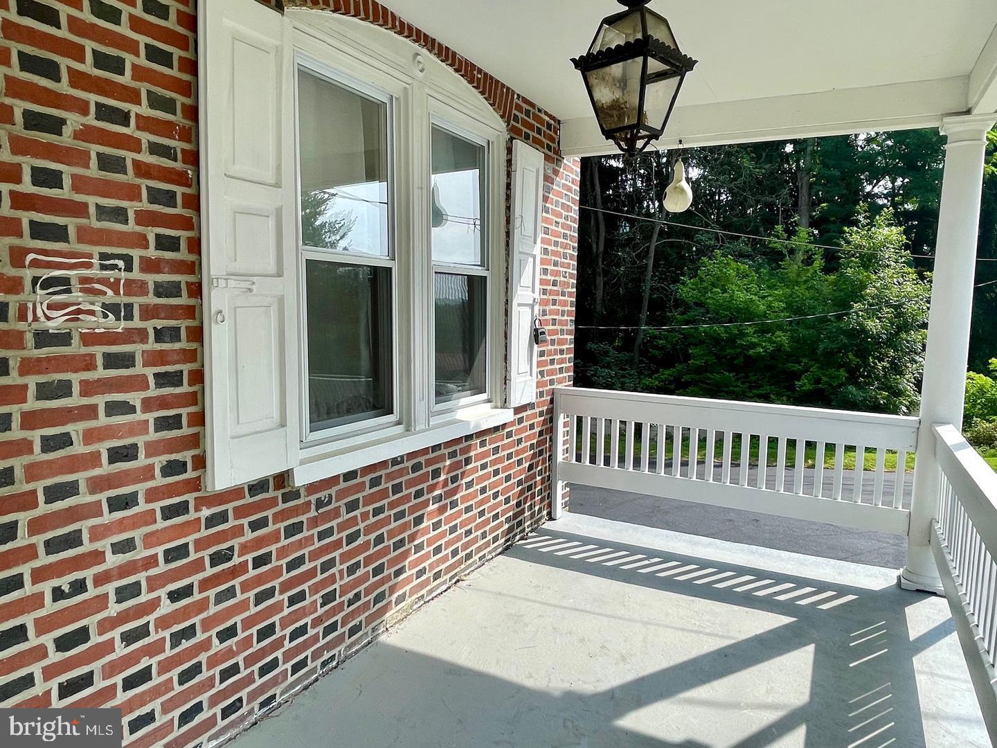 692 Lenni Road Aston, PA 19014 - Photo 2 of 28 a view of porch with a bench