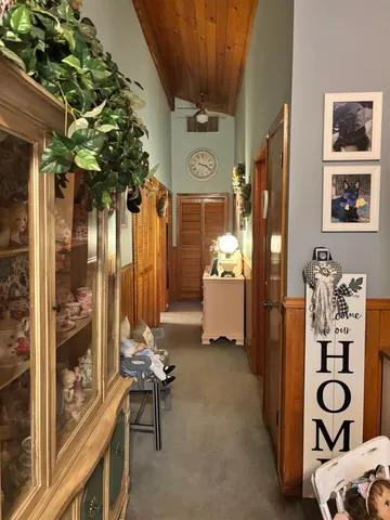 a view of a building with a bench in front of house