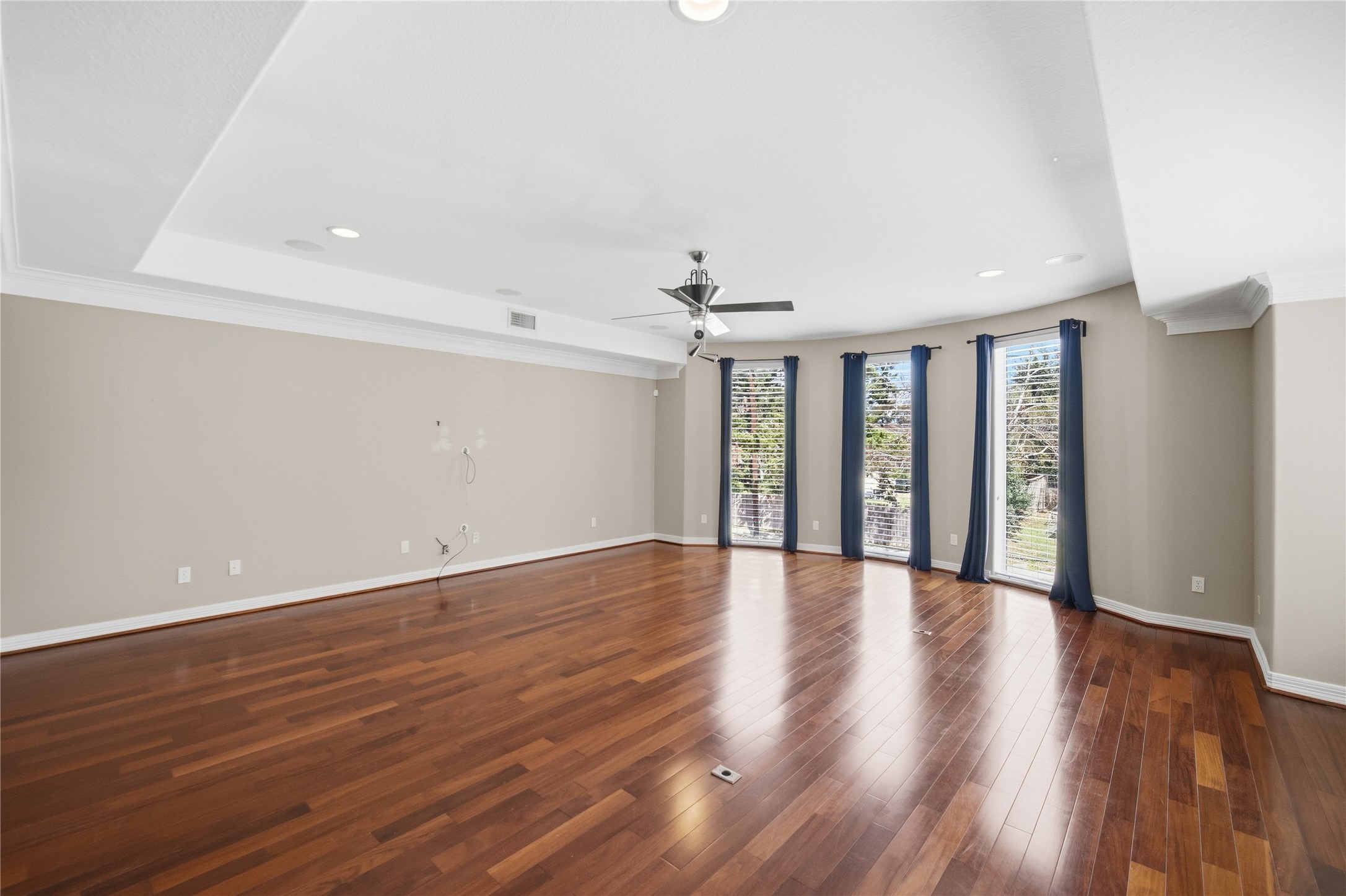 1316 Cleburne Street, Unit B Houston, TX 77004 - Photo 14 of 30 a view of an empty room with wooden floor and a window