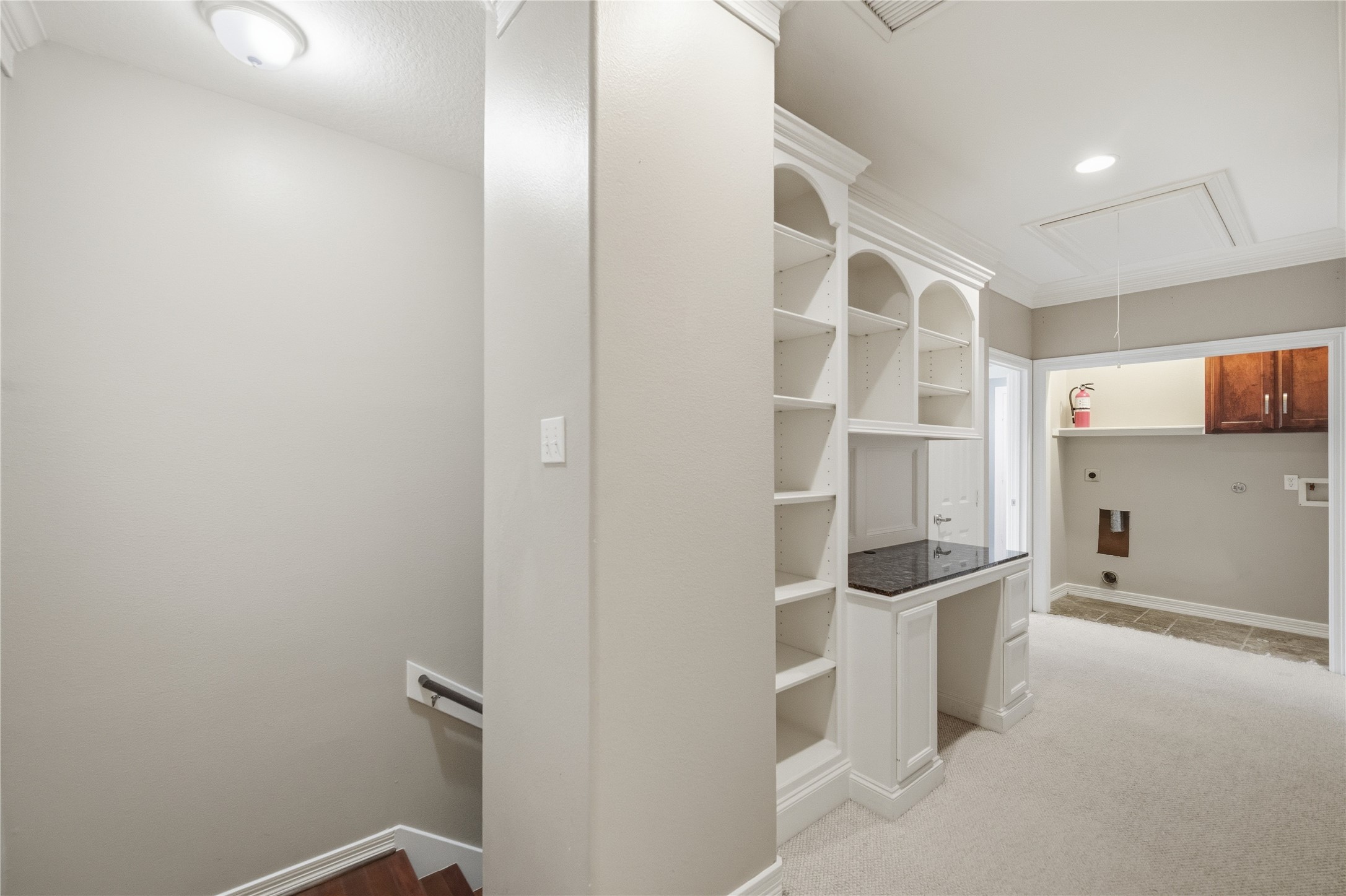 1316 Cleburne Street, Unit B Houston, TX 77004 - Photo 16 of 30 Just off the third-floor landing is a built-in desk with shelving, along with the utility room.
