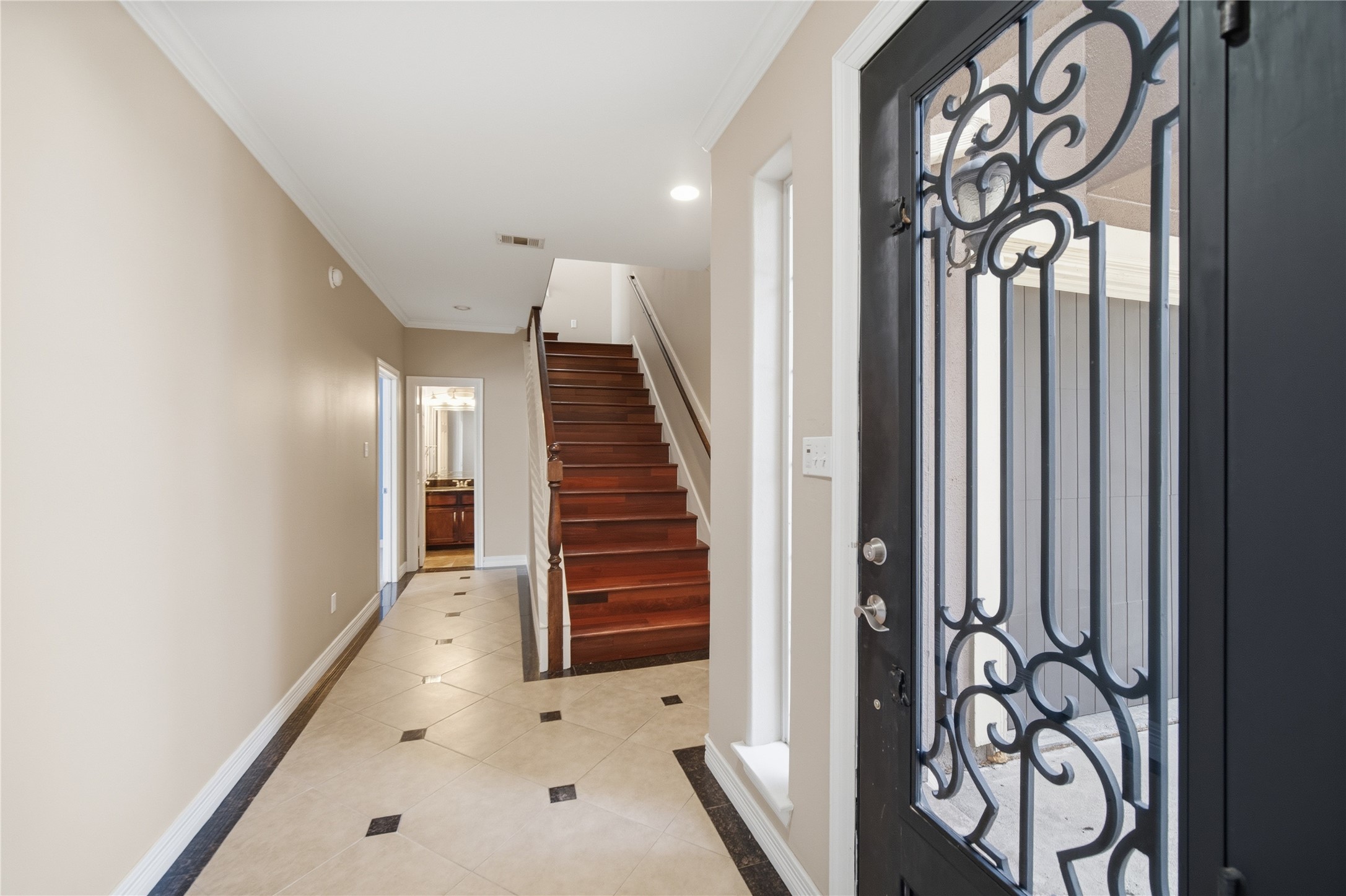 1316 Cleburne Street, Unit B Houston, TX 77004 - Photo 2 of 30 a view of a entryway with stairs