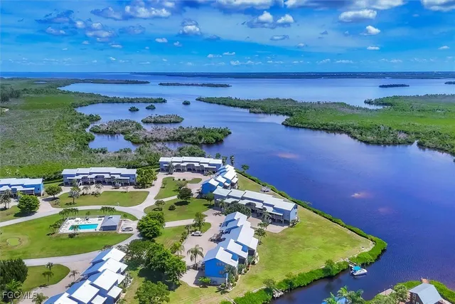 a view of a lake with a yard