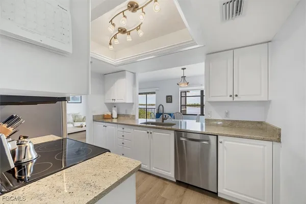 a kitchen with a stove and a microwave