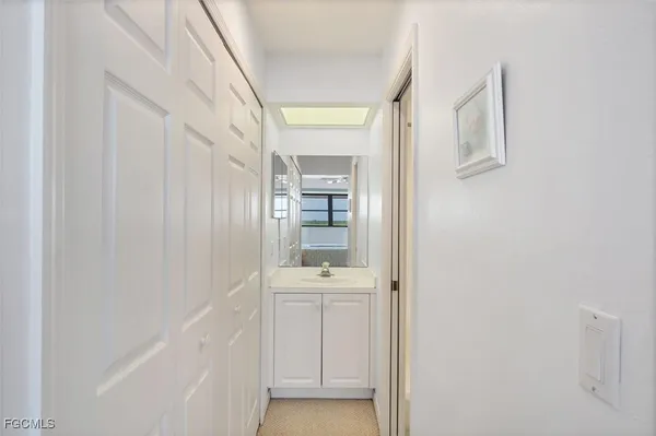a bathroom with a sink toilet a shower and a mirror