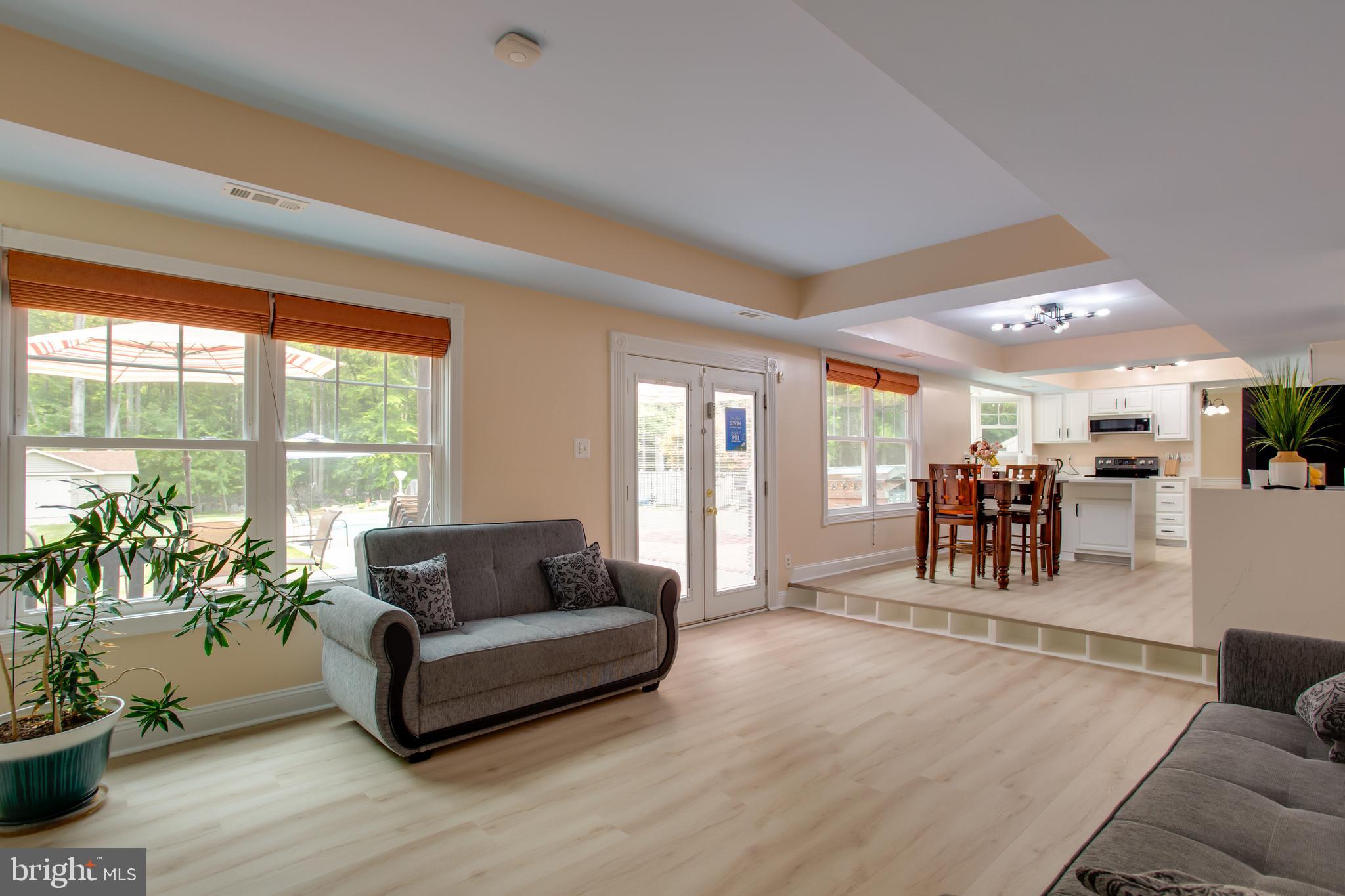 2904 Eutaw Forest Drive Waldorf, MD 20603 - Photo 11 of 59 a living room with furniture and a large window
