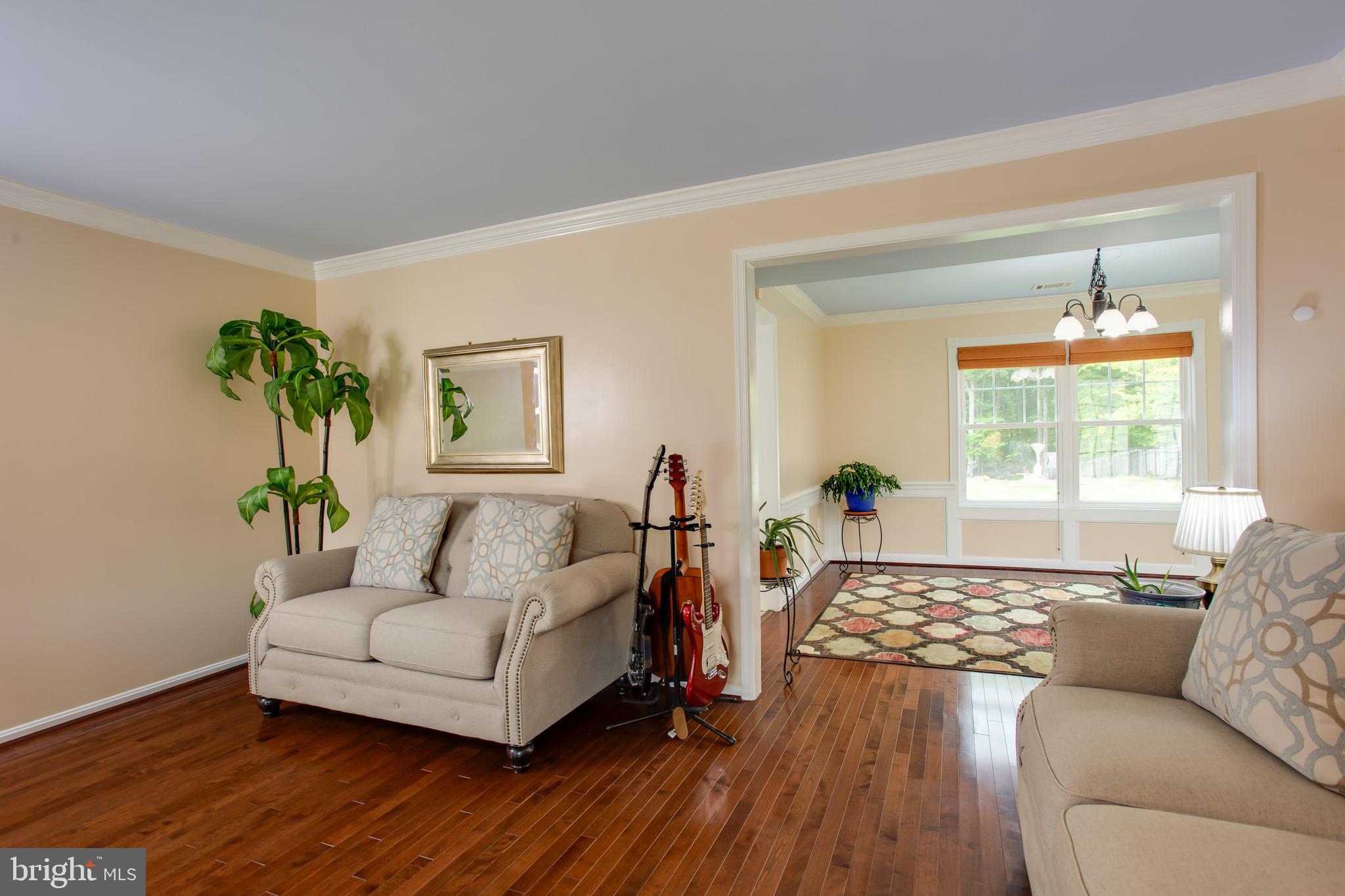 2904 Eutaw Forest Drive Waldorf, MD 20603 - Photo 19 of 59 a living room with furniture and a wooden floor