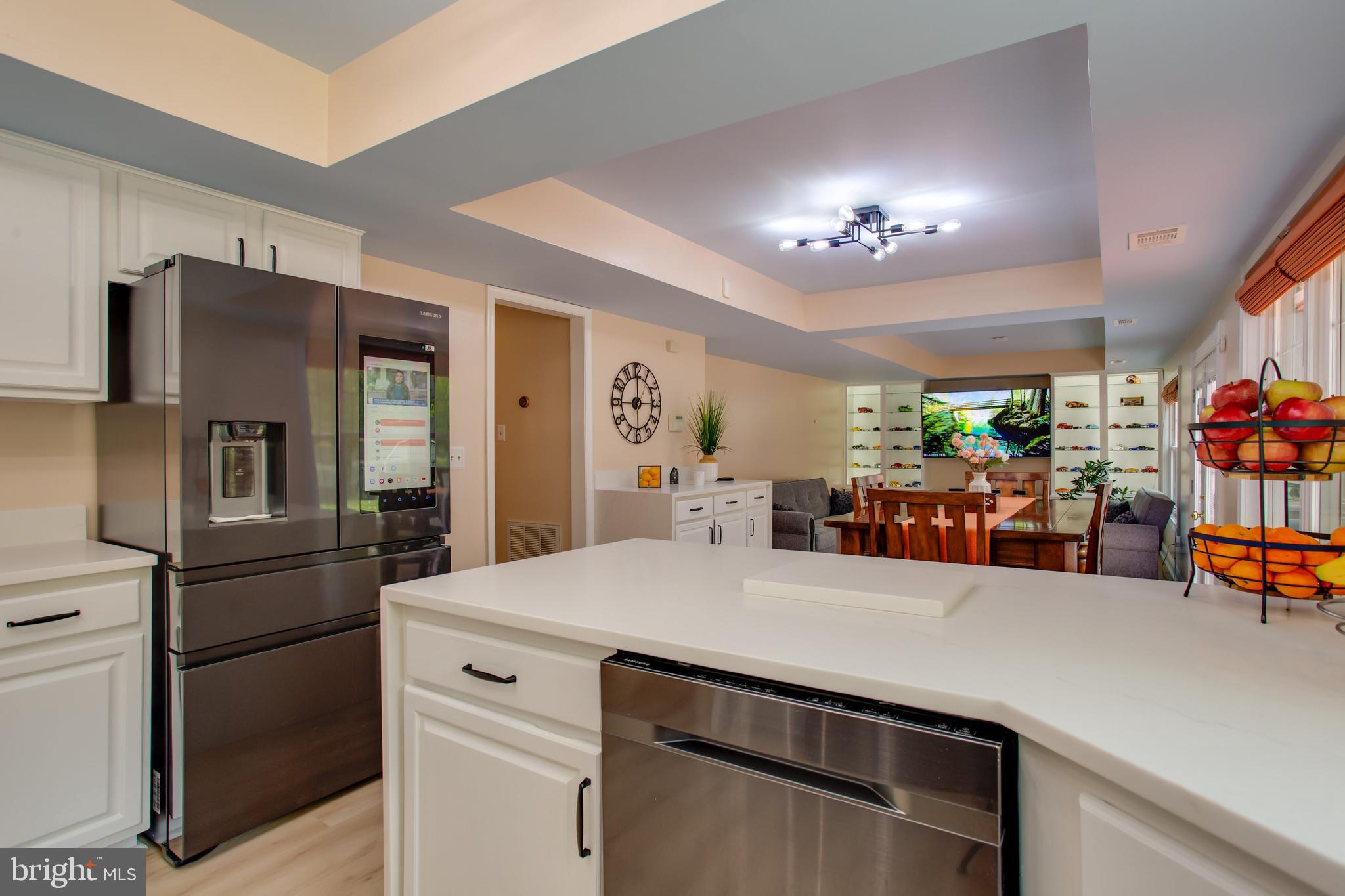 2904 Eutaw Forest Drive Waldorf, MD 20603 - Photo 26 of 59 a kitchen with stainless steel appliances a refrigerator and a stove