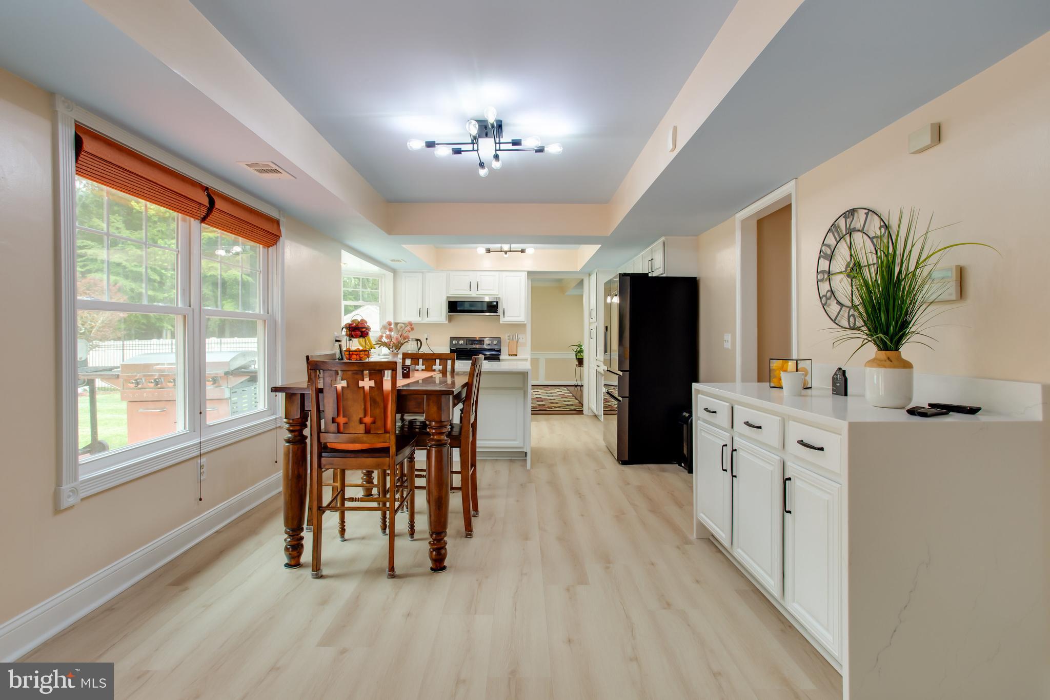 2904 Eutaw Forest Drive Waldorf, MD 20603 - Photo 31 of 59 a view of a dining room with furniture and chandelier