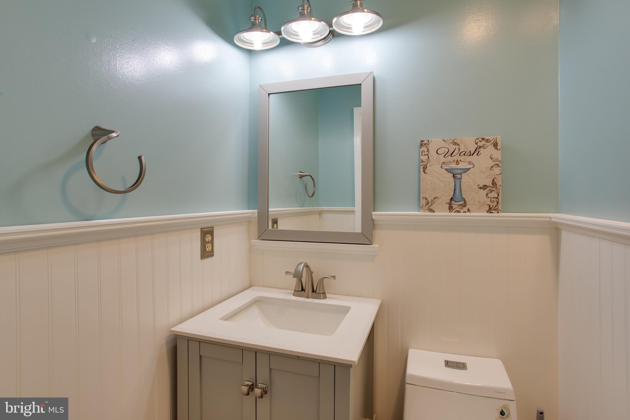 2904 Eutaw Forest Drive Waldorf, MD 20603 - Photo 34 of 59 a bathroom with a sink vanity and a mirror