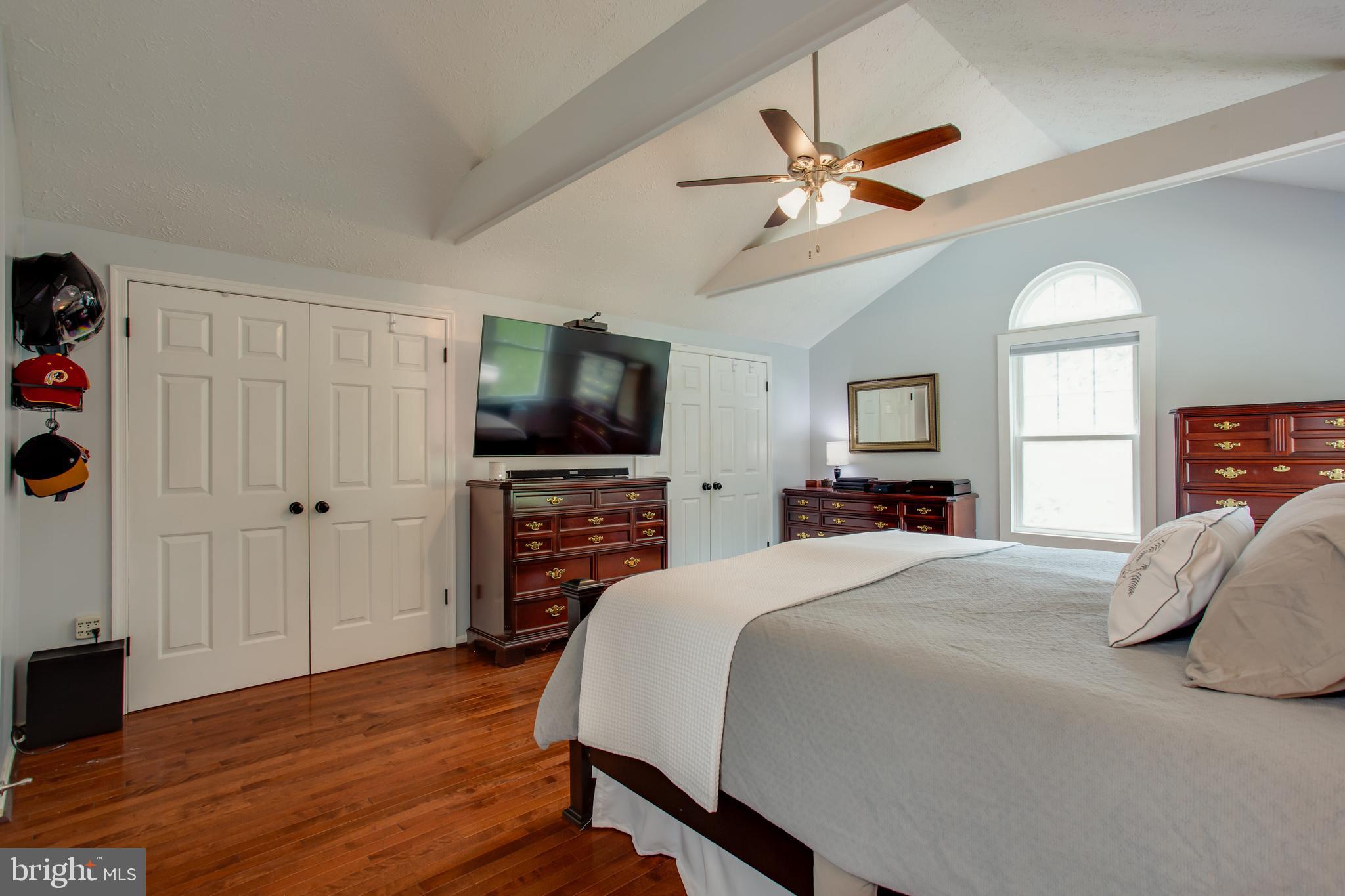 2904 Eutaw Forest Drive Waldorf, MD 20603 - Photo 35 of 59 a bedroom with a bed and a flat screen tv