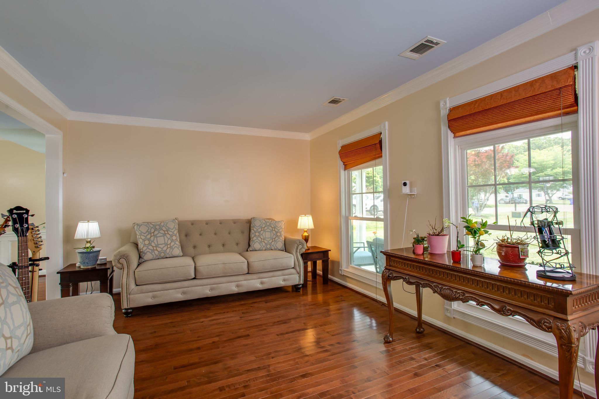 2904 Eutaw Forest Drive Waldorf, MD 20603 - Photo 7 of 59 a living room with furniture and a wooden floor