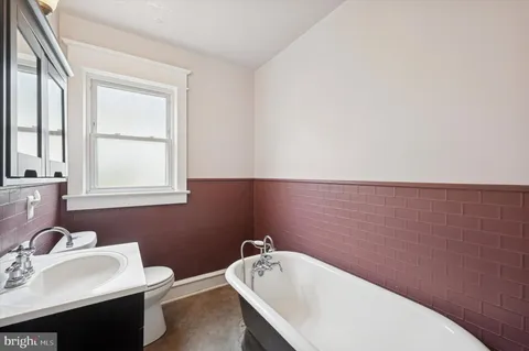 a bathroom with a sink and a bathtub