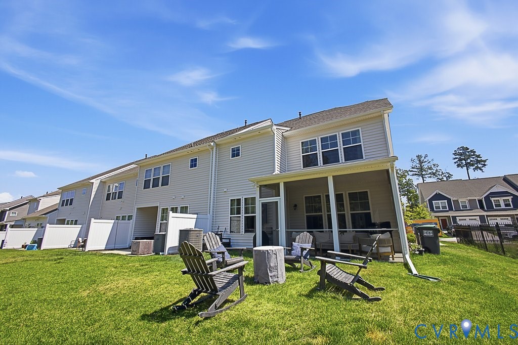 18517 Palisades Ridge Moseley, VA 23120 - Photo 36 of 55 a view of house with backyard and porch