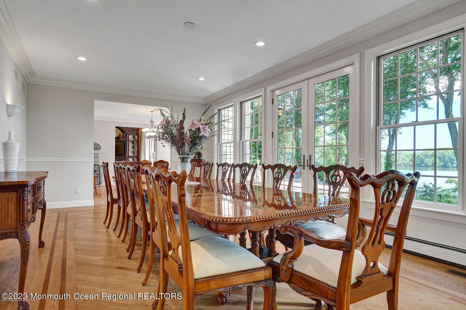 67 Phalanx Road Lincroft, NJ 07738 - Photo 16 of 55 a view of a dining room with furniture window and outside view