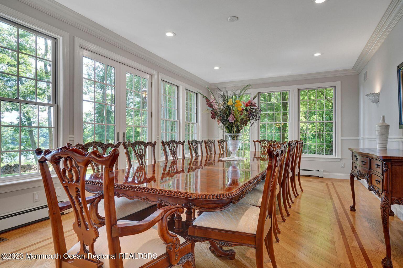 67 Phalanx Road Lincroft, NJ 07738 - Photo 17 of 55 a view of a dining room with furniture window and outside view