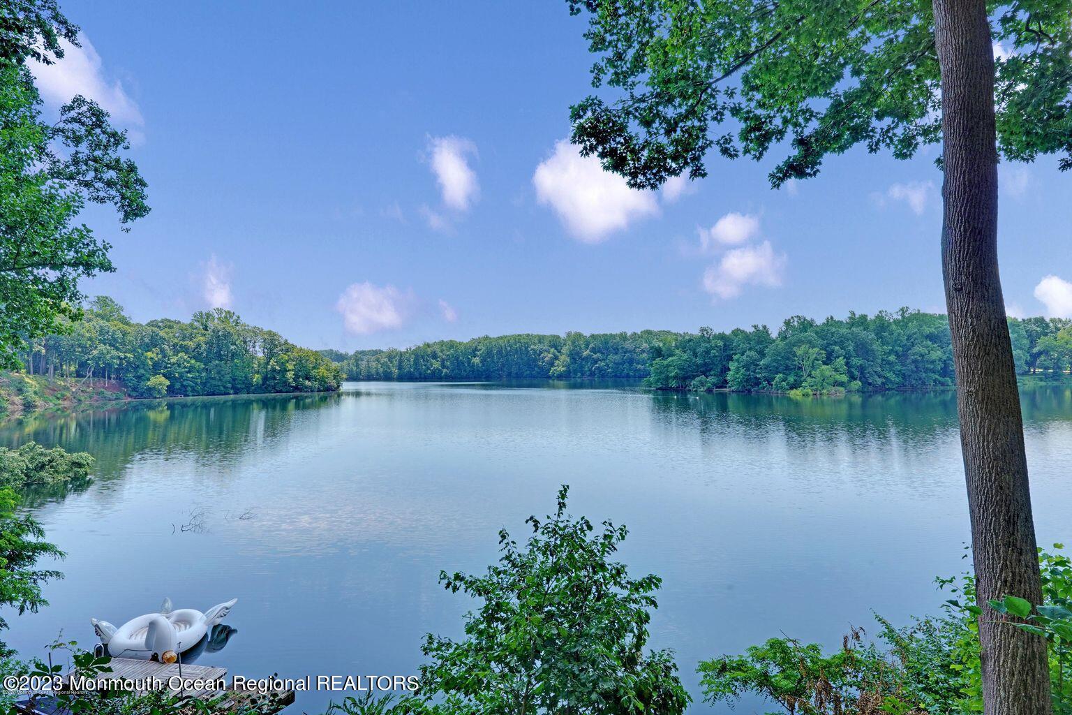 67 Phalanx Road Lincroft, NJ 07738 - Photo 2 of 55 a lake view with a lake view